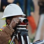 white and gray dumpy level