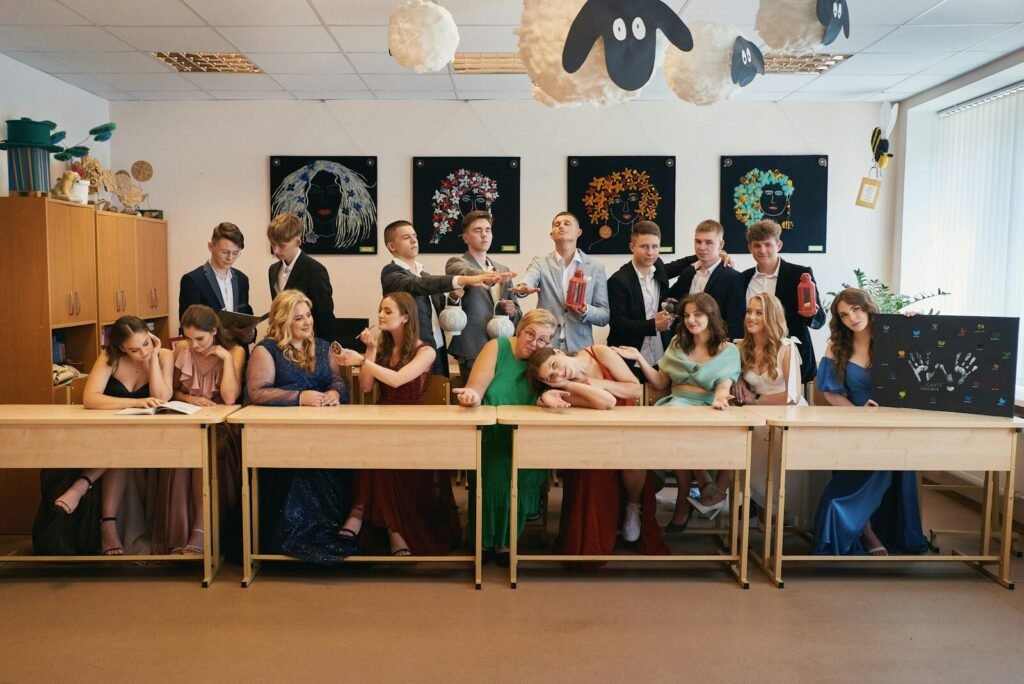 a group of people sitting at a long table