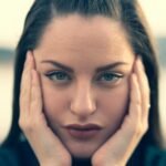 focus photography of woman's face