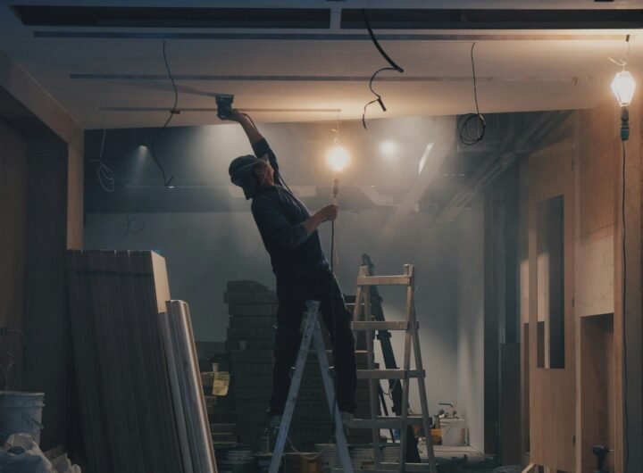 man on white ladder